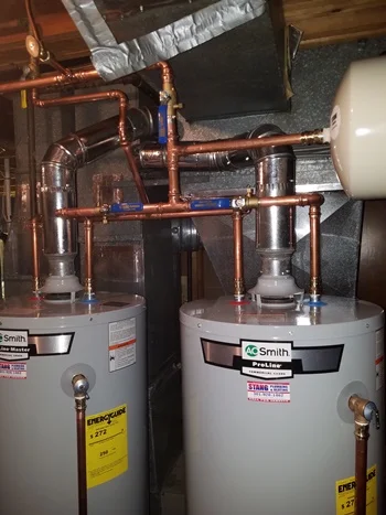 Dual residential water heater replacement and copper piping installation in Maryland